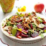 Salad with apple, beets and walnuts